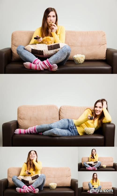 Young Woman Watching TV on the Couch