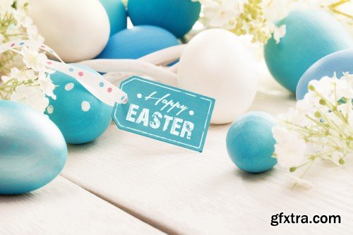 Easter background with chicks, flowers and Easter eggs