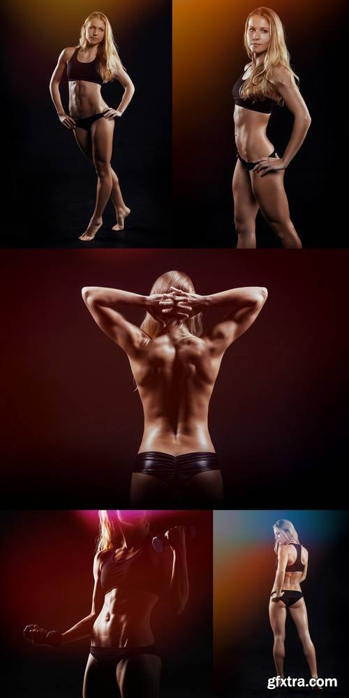 Muscular Fitness Woman Posing on a Dark Background