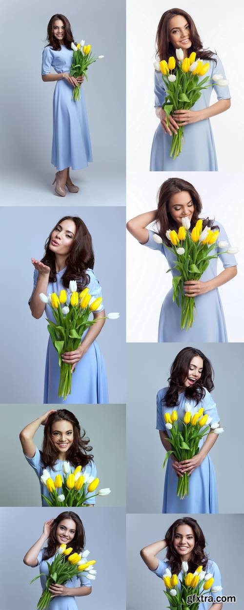 Beautiful Girl in the Blue Dress with Flowers Tulips in Hands