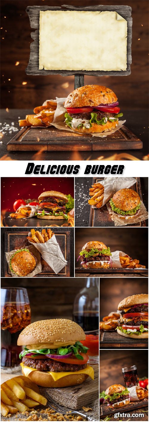 Delicious burger with chips and soda on wooden table