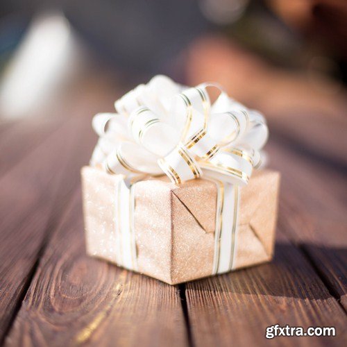 Gift box on a wooden background 13X JPEG