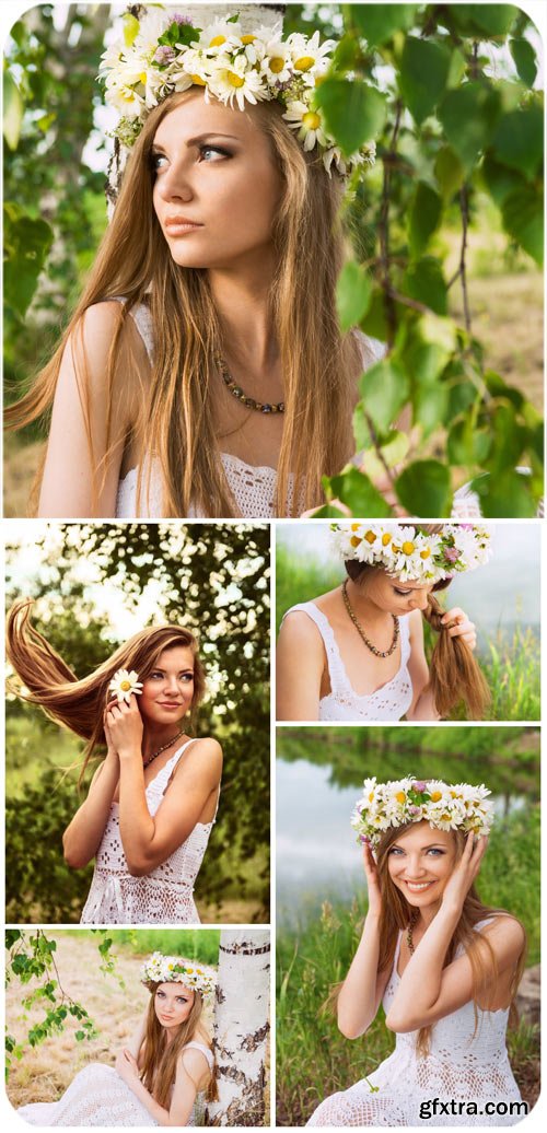 Girl with daisies in a birch grove