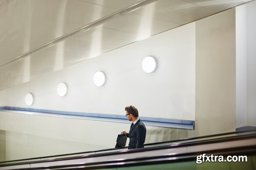 Collection a businessman man man on the escalator stairs 25 HQ Jpeg