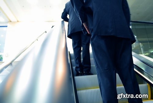 Collection a businessman man man on the escalator stairs 25 HQ Jpeg