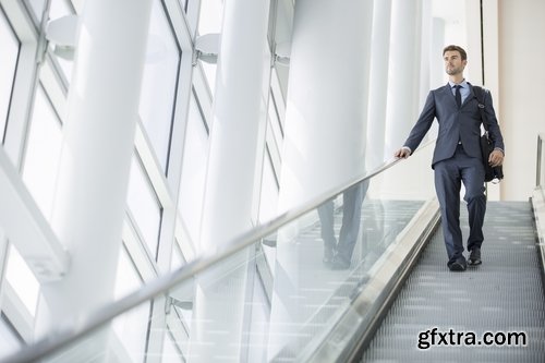 Collection a businessman man man on the escalator stairs 25 HQ Jpeg