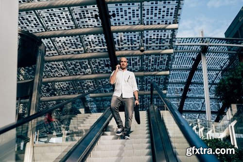 Collection a businessman man man on the escalator stairs 25 HQ Jpeg