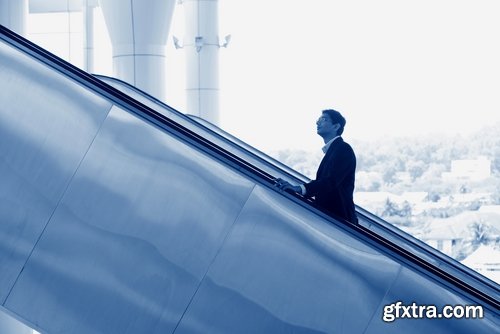 Collection a businessman man man on the escalator stairs 25 HQ Jpeg