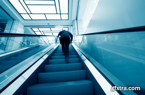 Collection a businessman man man on the escalator stairs 25 HQ Jpeg