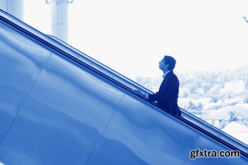 Collection a businessman man man on the escalator stairs 25 HQ Jpeg