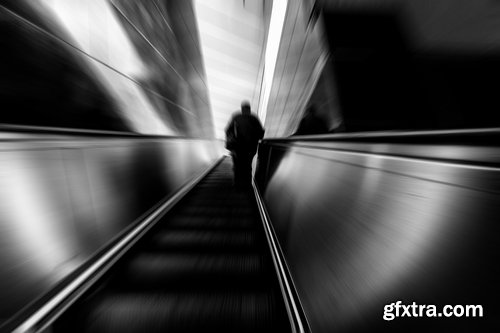 Collection a businessman man man on the escalator stairs 25 HQ Jpeg