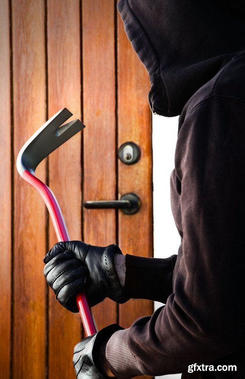 Burglar breaking in a house 7X JPEG