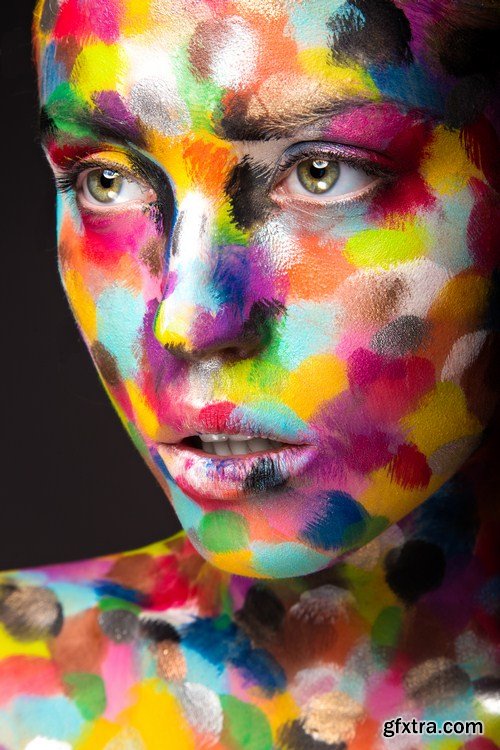 Girl with colored face painted 9X JPEG