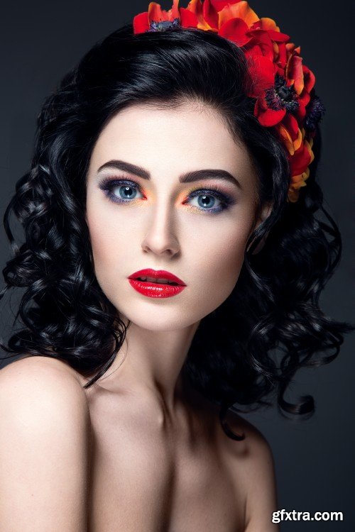 Beautiful young woman with flowers