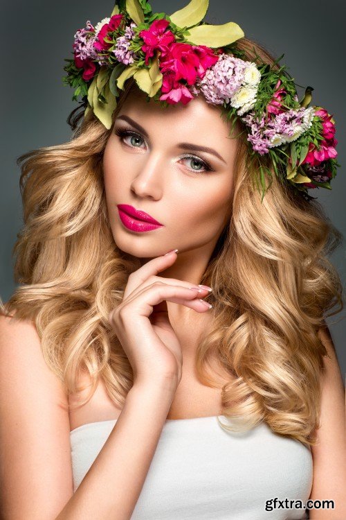 Beautiful young woman with flowers