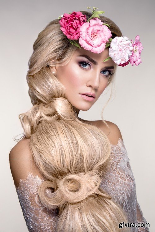 Beautiful young woman with flowers