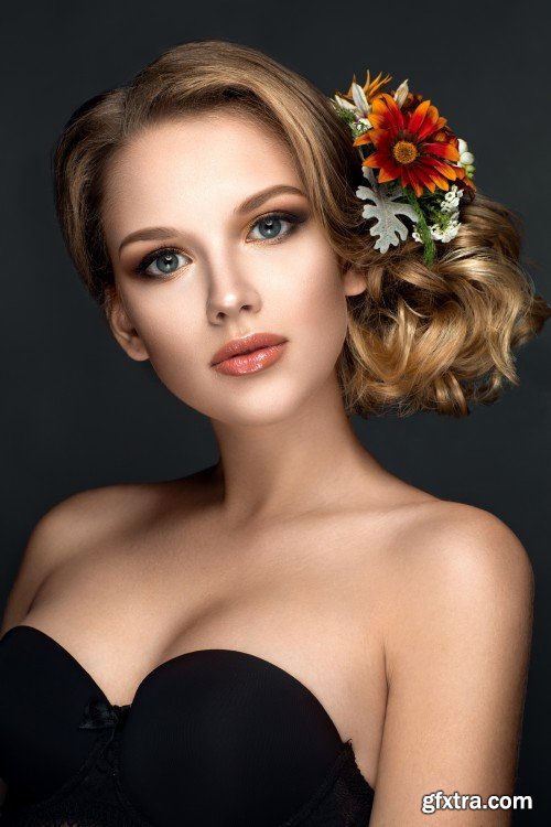 Beautiful young woman with flowers