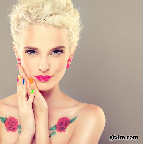 Stylish blonde girl with bright makeup and colorful nail