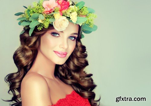 Beautiful woman model brunette with long curly hair floral wreath on the head