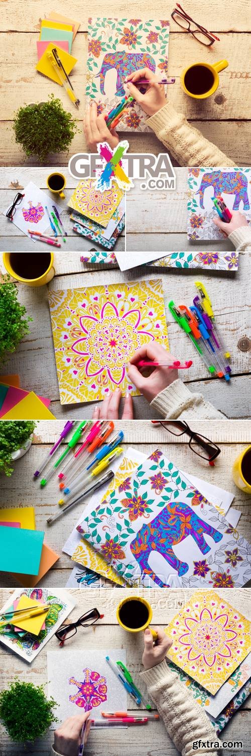 Stock Photo - Woman Coloring the Book