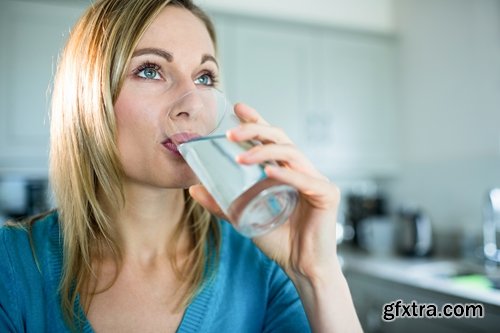 Collection of people man woman drinking a glass of clear water glass of liquid 25 HQ Jpeg