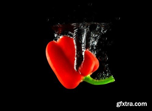 Vegetables in water on black background-9xUHQ JPEG