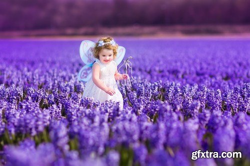 Cute girl in fairy costume in a flower field 6x JPEG