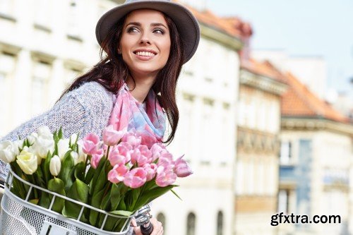 Girl on bike with tulips