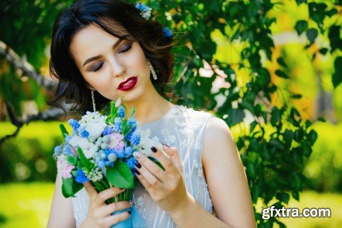 Beautiful bride, girl with flowers