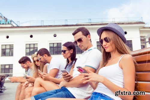 Group of diverse successful young  boyfriends and girlfriends having fun at summertime