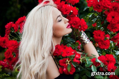 Fashion model girl portrait with red roses and red poppies