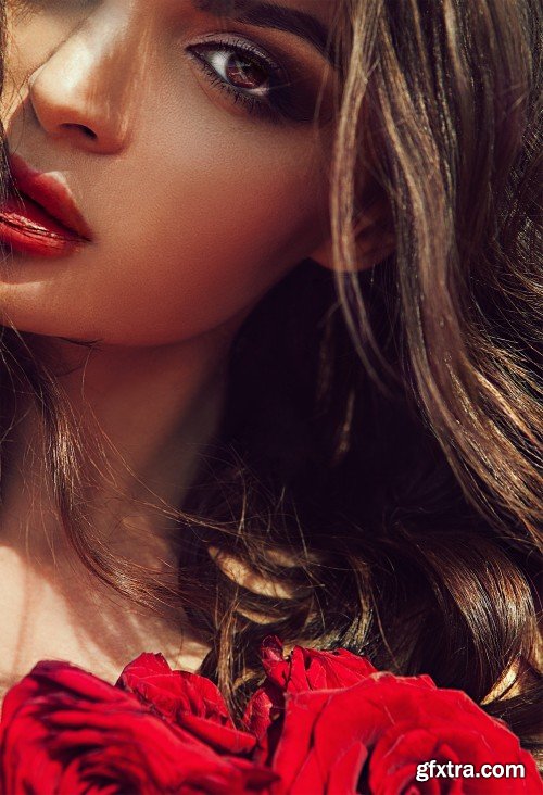 Fashion model girl portrait with red roses and red poppies