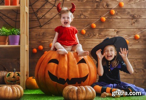 Children and pumpkins on Halloween