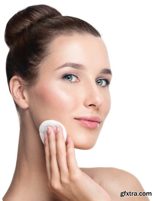 Happy smiling beautiful young woman cleaning skin by cotton pad, smiling woman and dental tools