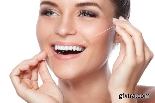 Happy smiling beautiful young woman cleaning skin by cotton pad, smiling woman and dental tools