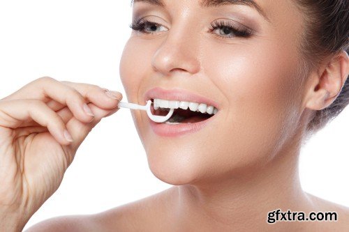 Happy smiling beautiful young woman cleaning skin by cotton pad, smiling woman and dental tools