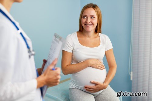 Consultant obstetrician pregnant on inspection 7X JPEG