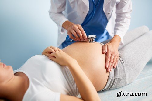 Consultant obstetrician pregnant on inspection 7X JPEG