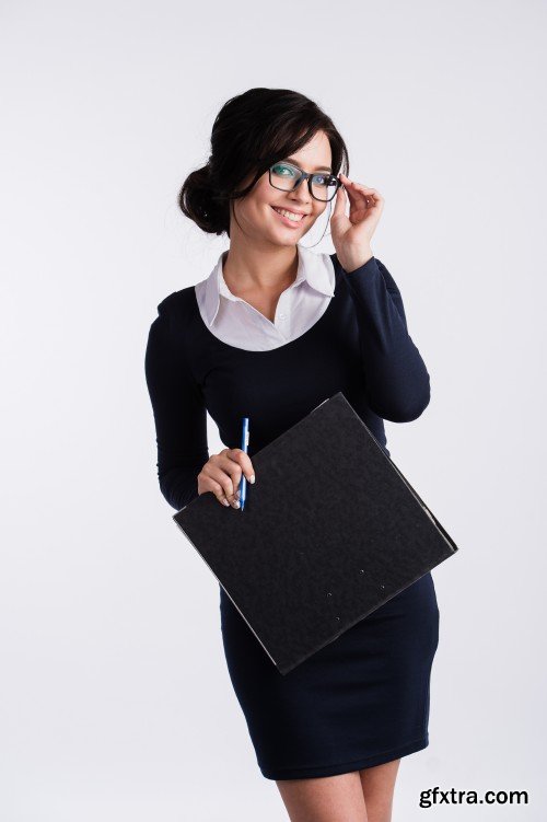 Attractive young business woman in glasses close-up portrait