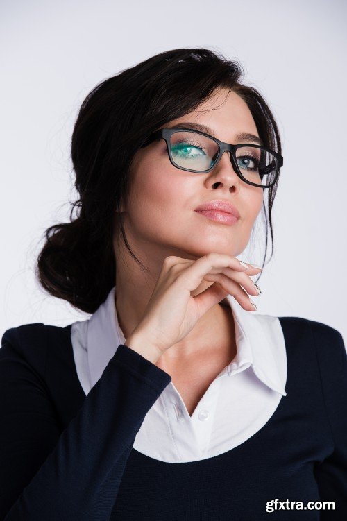 Attractive young business woman in glasses close-up portrait