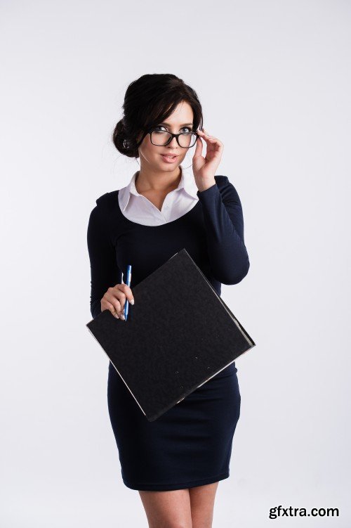 Attractive young business woman in glasses close-up portrait