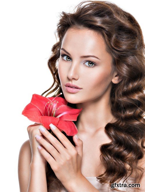 Beautiful young woman with a flower