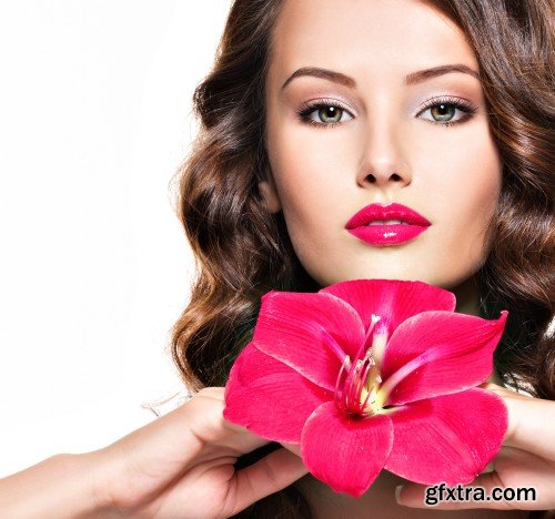 Beautiful young woman with a flower