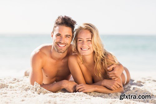 Young couple on the beach - 13xUHQ JPEG Photo Stock