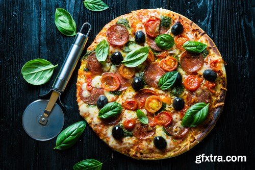 Delicious pizza on the table - 20xUHQ JPEG Photo Stock