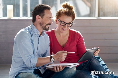 Woman and Man - Working with Laptop & Taking Notes 2 - 25xUHQ JPEG Photo Stock