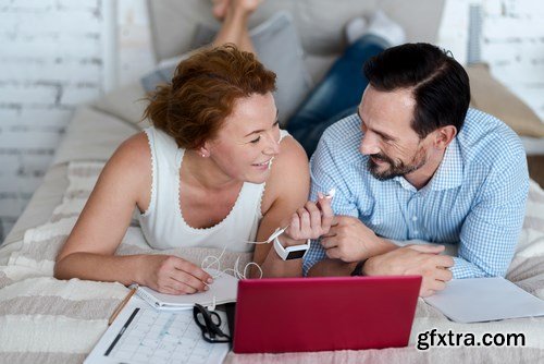 Woman and Man - Working with Laptop & Taking Notes 2 - 25xUHQ JPEG Photo Stock