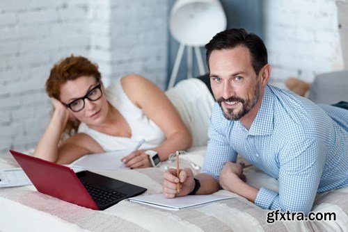 Woman and Man - Working with Laptop & Taking Notes 2 - 25xUHQ JPEG Photo Stock