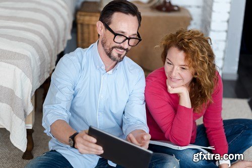 Woman and Man - Working with Laptop & Taking Notes 2 - 25xUHQ JPEG Photo Stock