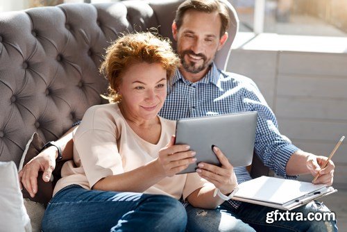 Woman and Man - Working with Laptop & Taking Notes 2 - 25xUHQ JPEG Photo Stock